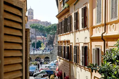 a view of a city street with cars and buildings at Monti Suite with charming Terrace in Rome