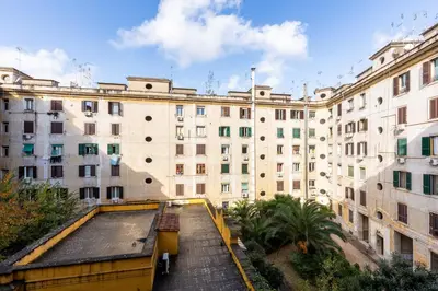 a view of a building from the top of a building at Lungotevere Aventino House by ACS HOLIDAYS in Rome