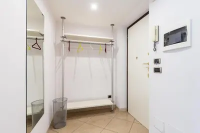 a bathroom with a shower and a glass door at Lungotevere Aventino House by ACS HOLIDAYS in Rome