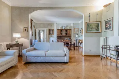 a living room with a couch and a table at Roman Holiday Repubblica in Rome