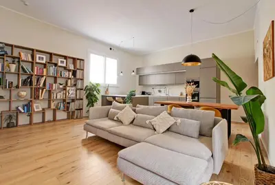 a living room with a couch and a table at Boncompagni79 design & comfort in the City Center Villa Borghese in Rome