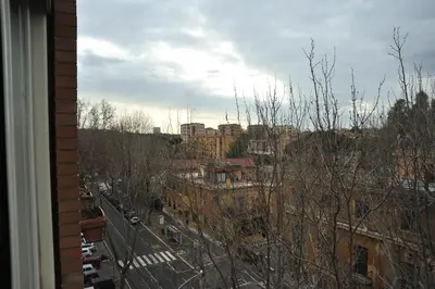 a view of a city from a window at Francis house in Rome