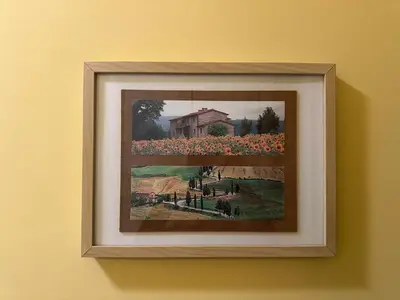 a picture of a painting of a house and flowers at Sunflower Rome in Rome