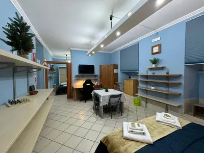 a room with a bed and a table in it at Charming Hideaway in P R A T I near Piazza Clodio in Rome