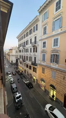 a view of a city street with cars parked in front of buildings at Casa dolce Casa Trastevere in Rome