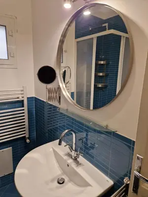a bathroom with a sink and a mirror at appartamento monticiano in Rome