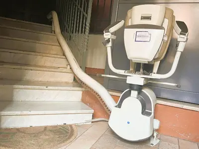 a toilet sitting next to a set of stairs at Home Roma Testaccio in Rome