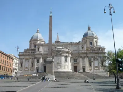 a large building with a monument in front of it at Il Mandorlo a Monti in Rome