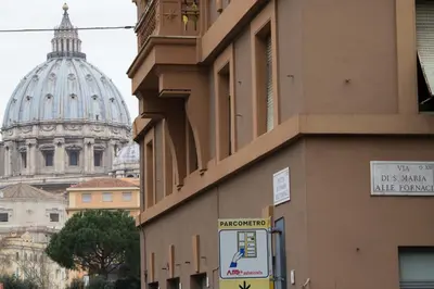 a view of a building with a domed building at YourStay@Rome Vatican in Rome