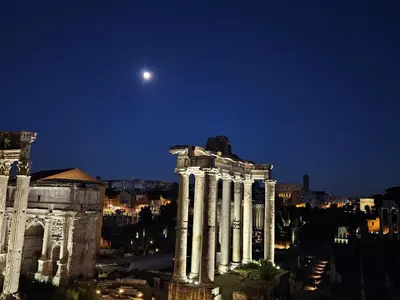 a large building with a statue in front of it at You'RhomeSuite in Rome
