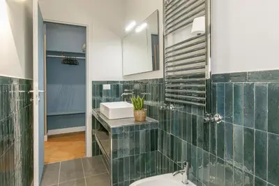 a bathroom with a sink and a toilet at Home Baccina 28 in Rome