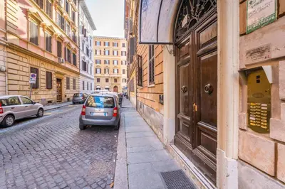 a small car parked on the side of a street at Dimora Esedra, Historical Flat in the Heart of Rome in Rome