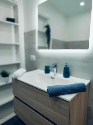 a bathroom with a sink and a mirror at Appartamento Lilly's Home Piazza Navona in Rome