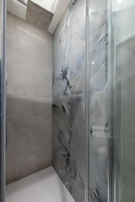 a walk in shower with a glass door at Appartamento Lilly's Home Piazza Navona in Rome