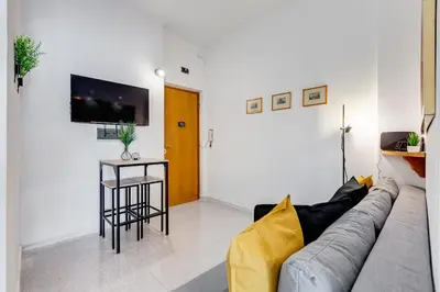 a living room with a couch and a table at Casa San Paolo in Rome