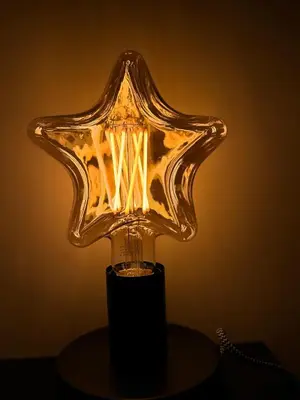 a illuminated lamp sitting on top of a table at suite Colosseo in Rome