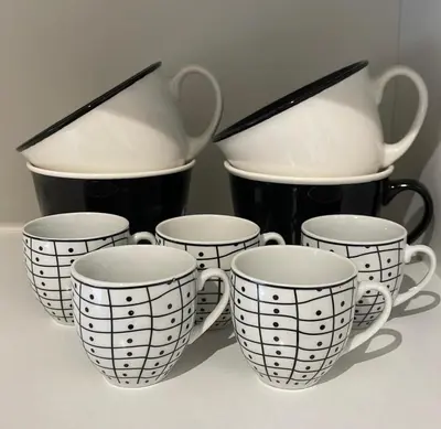 a group of coffee cups sitting on a table at Casetta via delle Cave in Rome