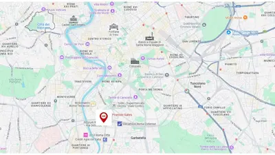 a map with a red marker on it at Piramide Suites 2 Bedrooms & 2 Bathrooms in Rome