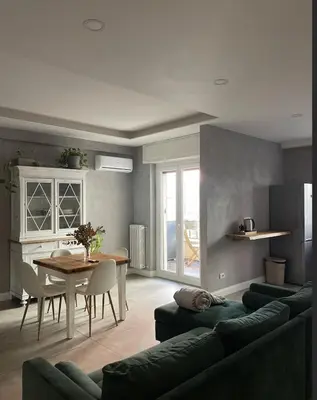 a living room with a couch and a table at A casa in Rome