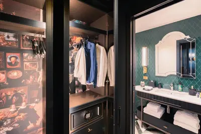 a bathroom with a sink and a mirror at The Goethe Hotel - Small Luxury Hotels of the World in Rome