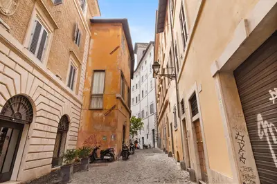 an alley in an old city with buildings at Navona Charming Apartment by Romeloft in Rome