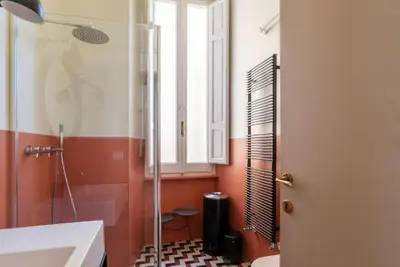 a bathroom with a shower and a sink at GuestHost - Central and Modern apartment in Rione Monti in Rome