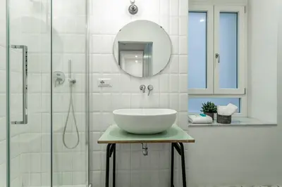 a bathroom with a sink and a shower at Iflat Cozy Studio in the Heart of Campo de Fiori in Rome