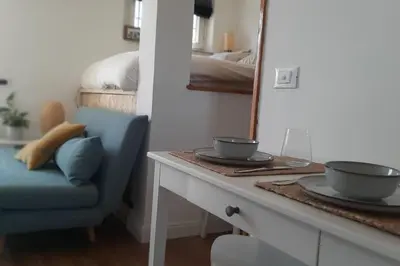 a room with a table with two bowls on it at Amazing studio with terrace in Rome