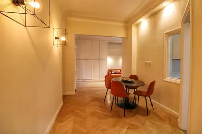 a dining room with a table and chairs at Domus Mazzini in Rome