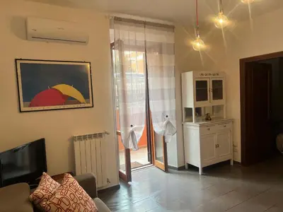 a living room with a couch and a television at Domus del Vicario in Rome