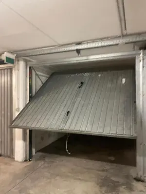 a large empty garage with a large gray roof at Domus del Vicario in Rome