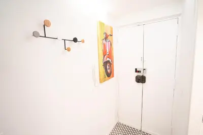 a bathroom with a shower and a door at Monti Elite House in Rome