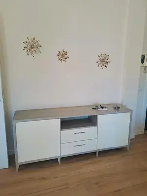 a desk in a room with a white wall at Elegance Penthouse 959 in Rome