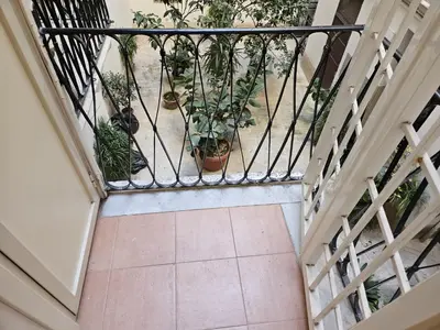 an overhead view of a balcony with potted plants at Raggio di Sole in Rome