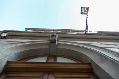 a building with an arch over a door at Sistina 138 Luxury Home in Rome