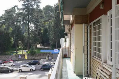 a balcony with a view of a parking lot at Casa NeLLa, Apartment with 2 bedrooms, Rome in Rome