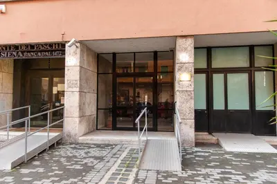 an entrance to a building with glass doors at Sidama Boutique Stay in Rome