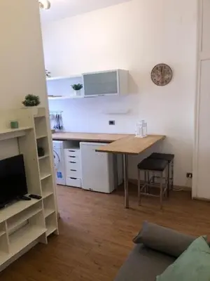 a room with a desk and a computer in a room at Mattia Home in Rome