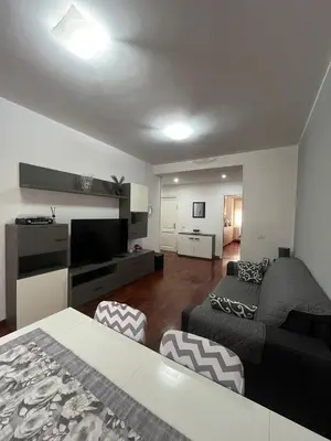 a living room with a bed and a couch at MichelleHouse in Rome