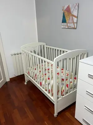 a nursery with a crib filled with toys at MichelleHouse in Rome