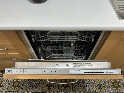 an oven with a stack of dishes in it at Serendiroma in Rome