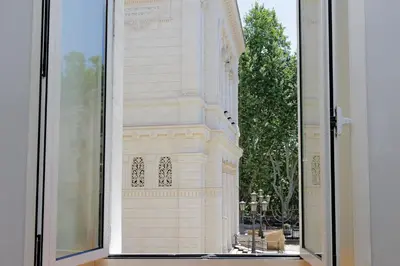 a view of a building through a window at Luxury home in the Ghetto's heart in Rome
