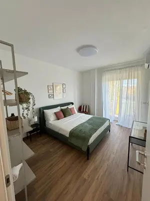 a bedroom with a bed and a ladder in it at A casa di nonna Lina - Apartment in Ostiense in Rome