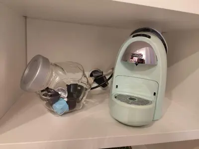 a blender sitting on top of a counter at Lovely Flat Roma Università in Rome