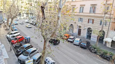 a view of a city street with cars parked at Casa Gabri in Rome