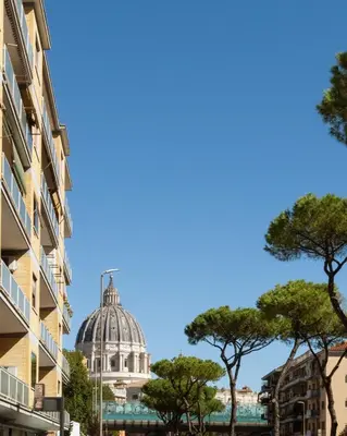 a view of the capitol building with trees in the foreground at Sergio I Apartment in Rome