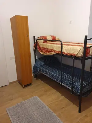 a room with two bunk beds and a cabinet at Tom 38 in Rome