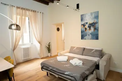 a bathroom with a shower and a sink and a mirror at Designer Apartment 5' Pantheon Wi-Fi & AC in Rome