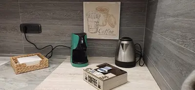 a coffee maker and a box on a counter at Casetta clodio in Rome
