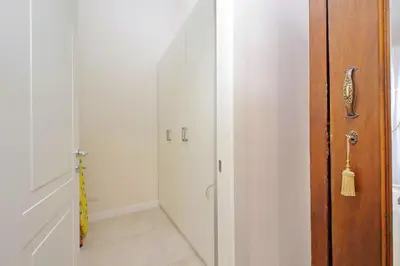 a room with a door and a hallway with a hallway at Balconcino romantico a via Aosta in Rome